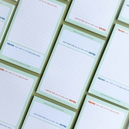 Multiple 'Busy at work, alive after work' notepads laid out in a grid pattern showing the dual 'Notes' section layout